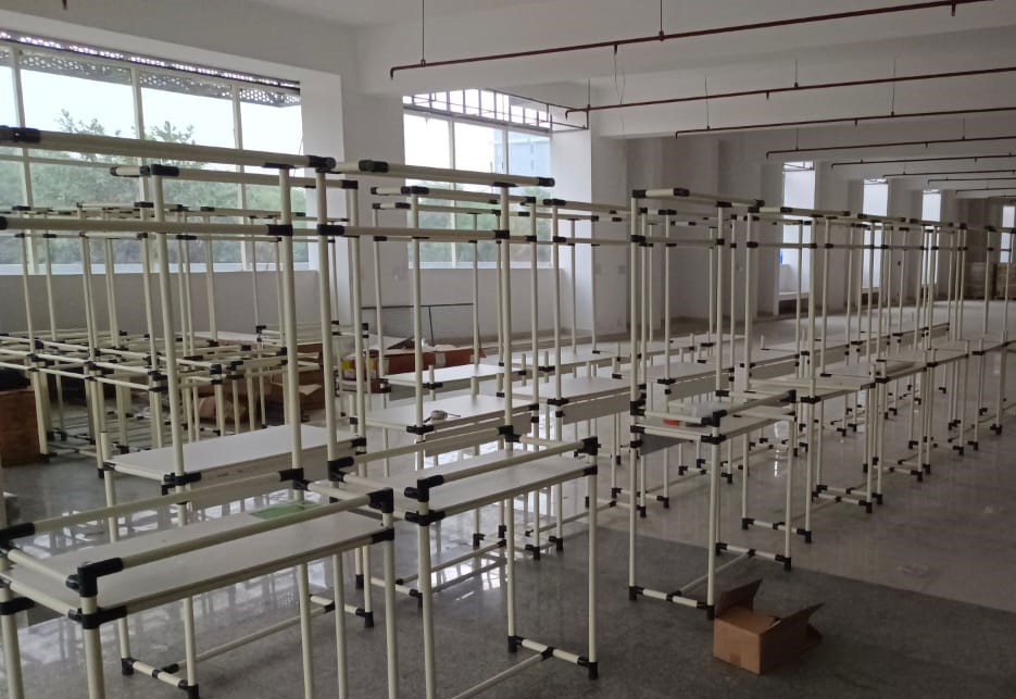 Custom-designed assembly workstation tailored to Mackefone's product assembly requirements by Warehouse International Pvt. Ltd. in Noida Sector 90