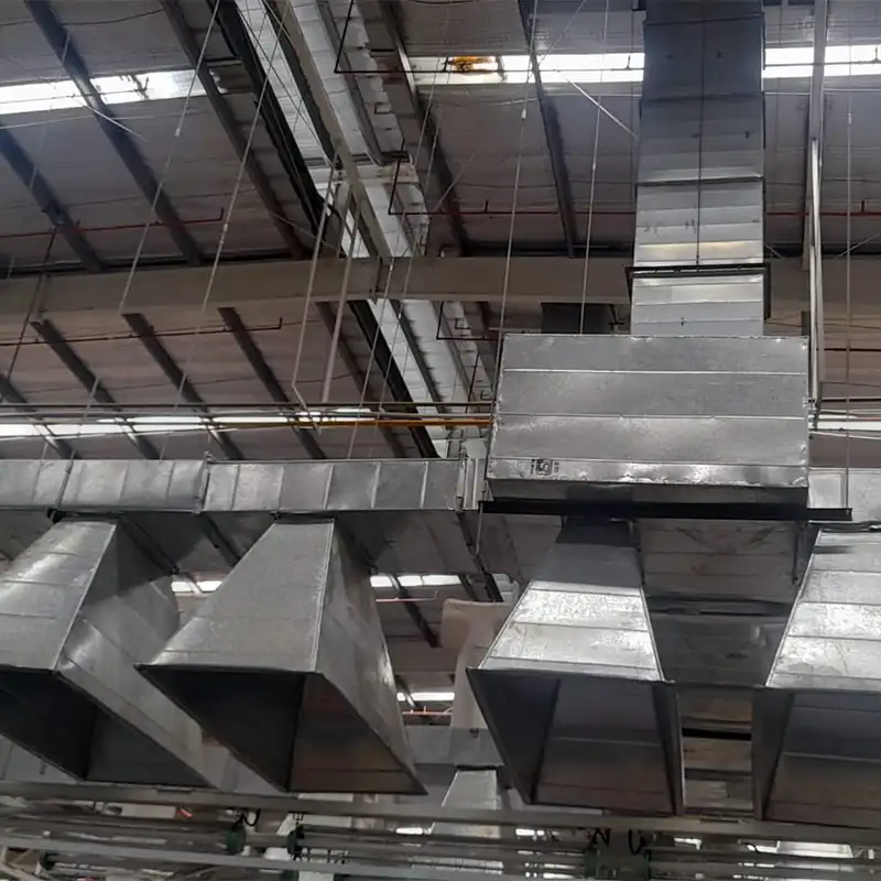 Seamless integration of exhaust ducting in industrial settings by Warehouse International for superior ventilation solutions.